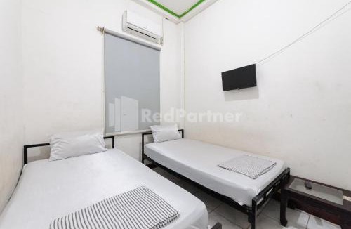 Palembang Hotel | Ombai Guest House 27 Syariah Mitra RedDoorz