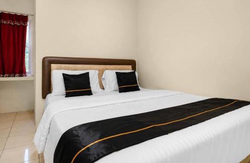 Palembang Hotel | Hotel O near Social Market formerly Kosta Living