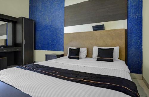 Palembang Hotel | Hotel O near Universitas Widya Dharma formerly Nugraha Residence