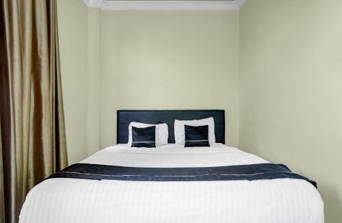 Palembang Hotel | Hotel O near Universitas Widya Dharma formerly Nugraha Residence