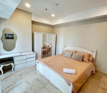 Medan Apartment | Podomoro Delipark Apartemen CozyCrowd Empire Tower 4BR 3 King and 1 single bed Medan - 110m