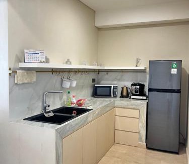 Medan Apartment | Podomoro Delipark Apartemen CozyCrowd Empire Tower 4BR 3 King and 1 single bed Medan - 110m