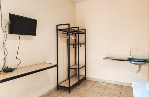 Jambi Hotel | RedDoorz Syariah near Terminal Alam Barajo Jambi