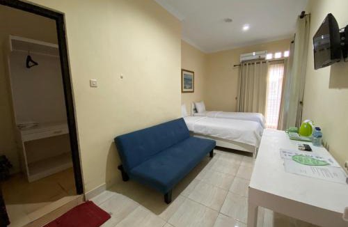 Sleman Hotel | Omah Inap D24 Syariah near Universitas Aisyiah Yogyakarta Mitra RedDoorz