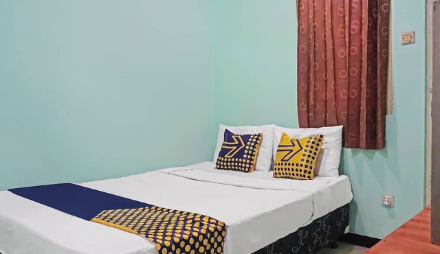 SPOT ON 91860 Amazon Homestay Syariah 2 in Tjihadak