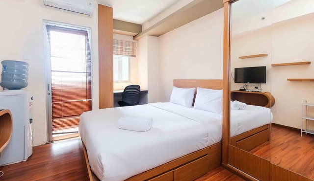 Homey and Cozy Living Studio at Pakubuwono Terrace Apartment