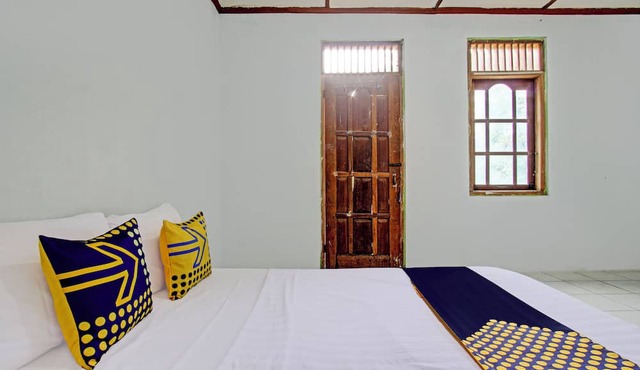 SPOT ON 93592 Pondok Backpackers Ardafa JogjaNearBlue Lagoon Jogja in Ngemplak