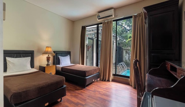 Arimbi Pejaten Suites
