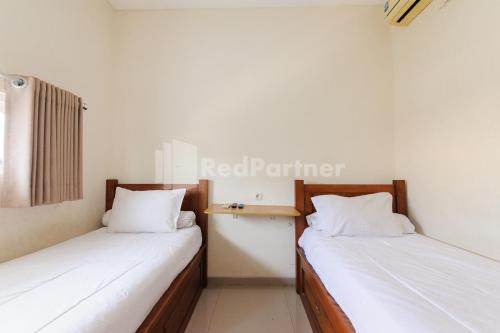 Nipa Guest House near Universitas Widyagama Mitra RedDoorz in Blimbing