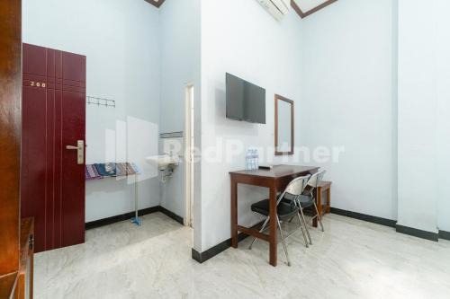 Wisma Kartini 2 Syariah near Suncity Mall Sidoarjo RedPartner in Sidoarjo