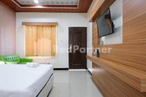 As Waru Hotel RedPartner
