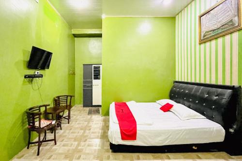 RedDoorz at MCLOS Syariah Guest House Rantau Perapat