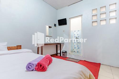 Nafisa Homestay Syariah Near Jatim Park 3 Batu Mitra RedDoorz in Malang
